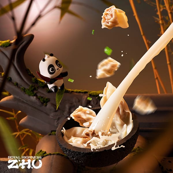 A cartoon panda watches dumplings and green onions fall into a bowl of splashing milk.